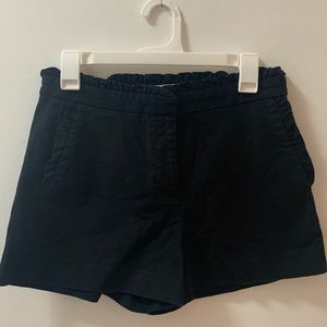 High-waisted black dress shorts